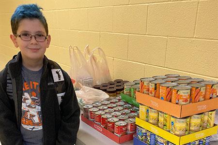 Gilles-Sweet Food Drive Collection with Student Dominic D.